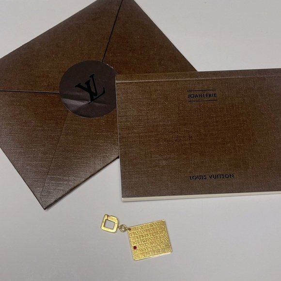 Louis Vuitton Jewelry - LOUIS VUITTON 18KT GOLD CALENDAR CHARM W/RUBY VINTAGE 2005